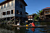 Inle Lake Myanmar. All the buildings are constructed on piles. Residents travel around by canoe, but there are also bamboo walkways and bridges over the canals, monasteries and stupas. 